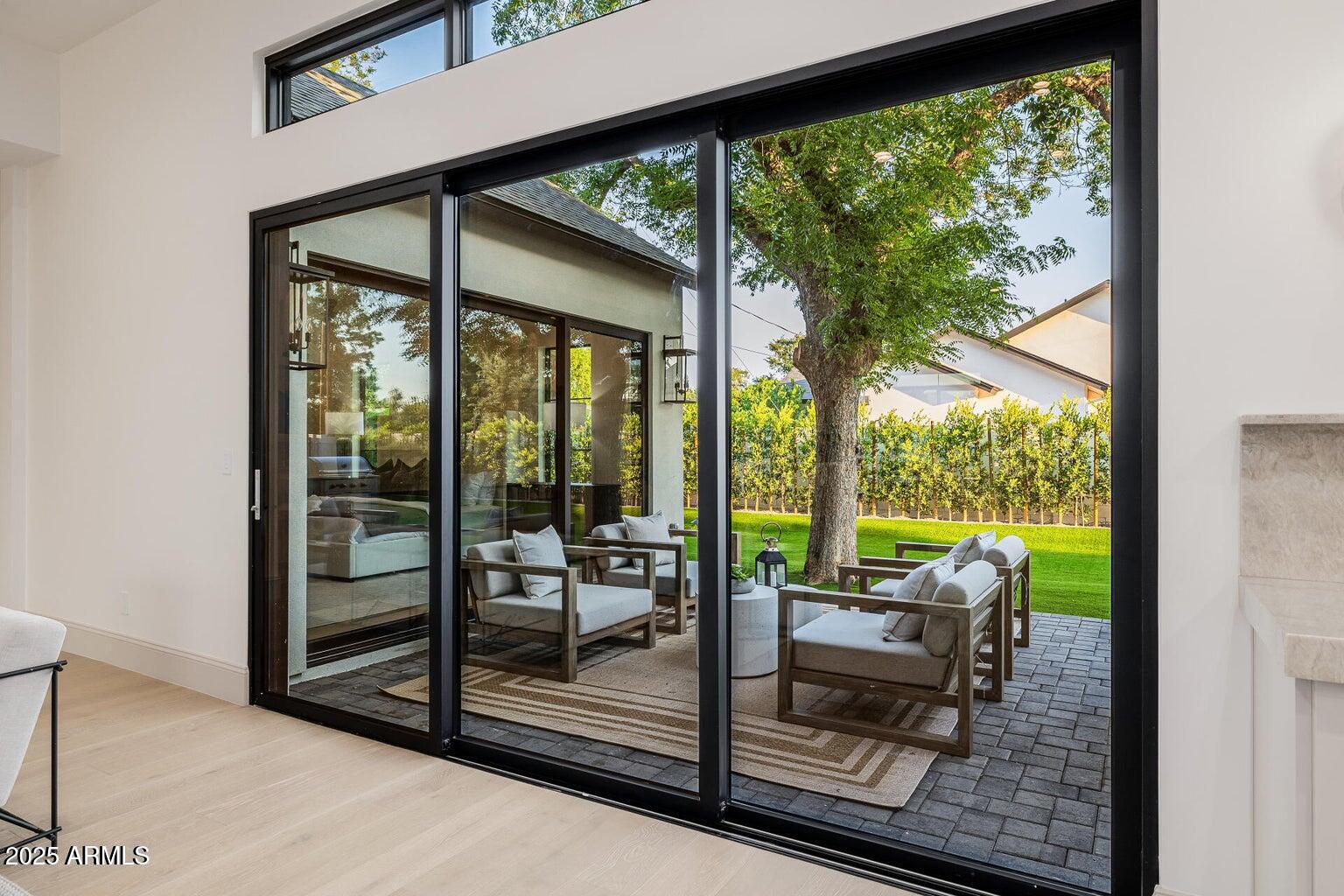 3301 East Elm Street Phoenix, AZ 85018 - Photo 28 of 36 a view of a room with wooden floor and balcony