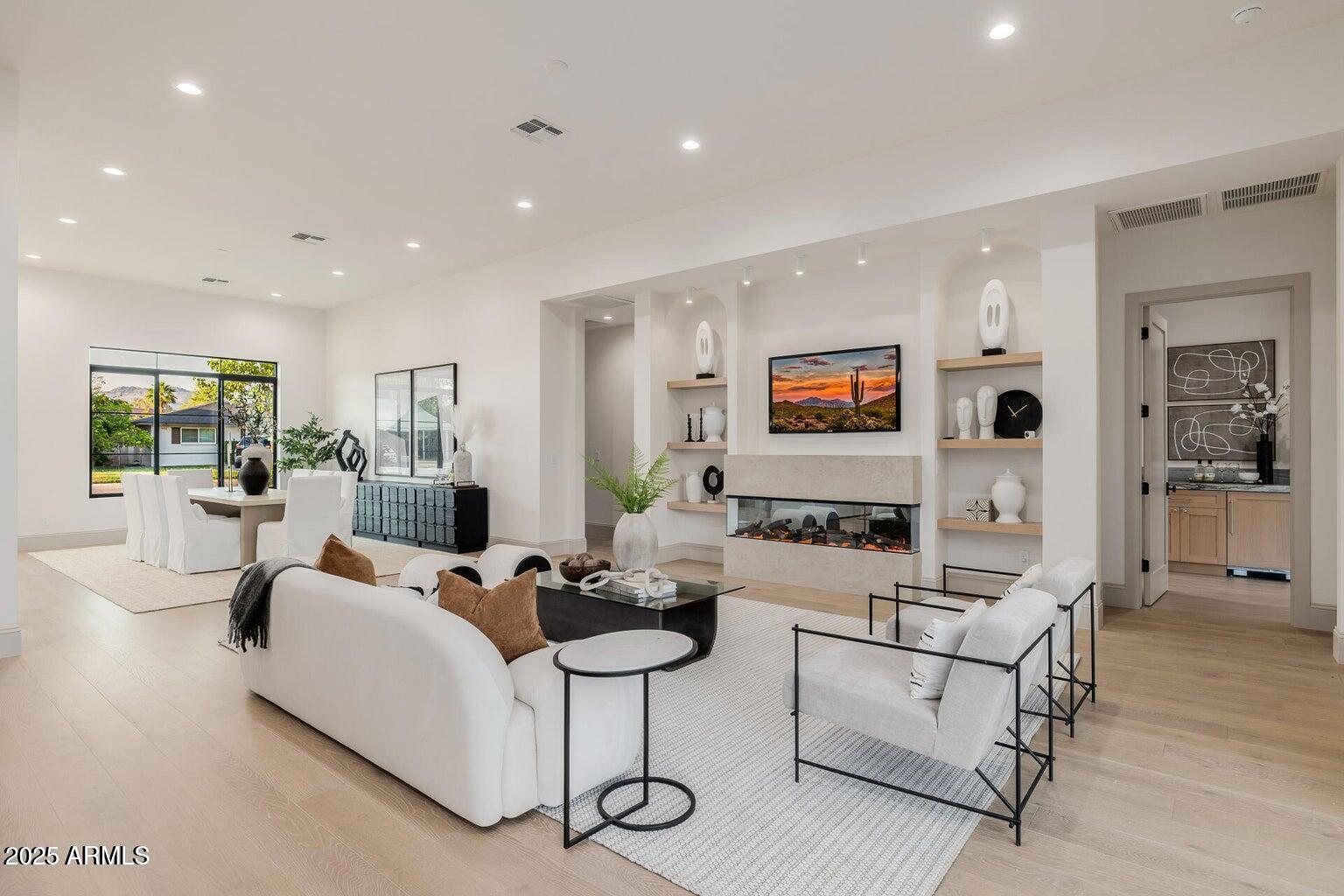 3301 East Elm Street Phoenix, AZ 85018 - Photo 4 of 36 a living room with furniture and wooden floor