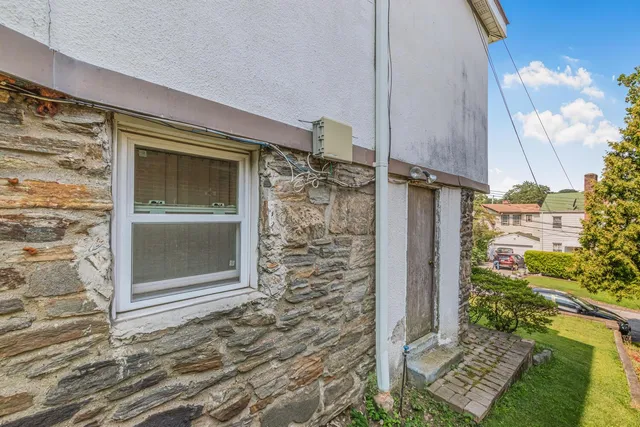 a view of a chairs and table in a backyard