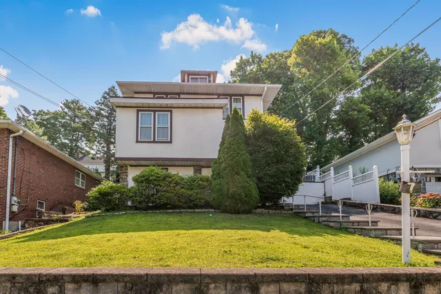 a view of a house with a swimming pool