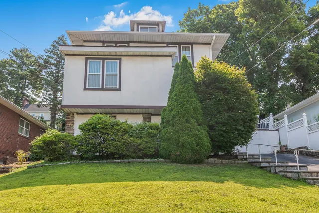 a view of a house with a swimming pool