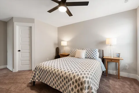 a bedroom with a bed and closet