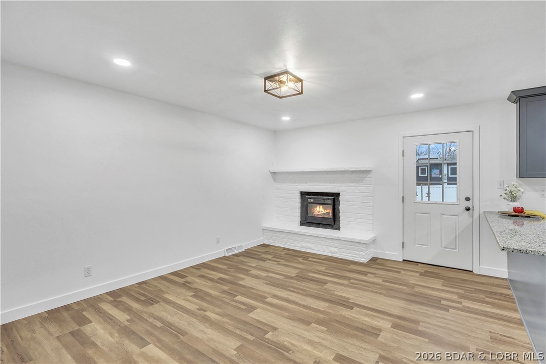 107 Lynn Avenue Eldon, MO 65026 - Photo 7 of 55 Old charm fireplace with updated charm