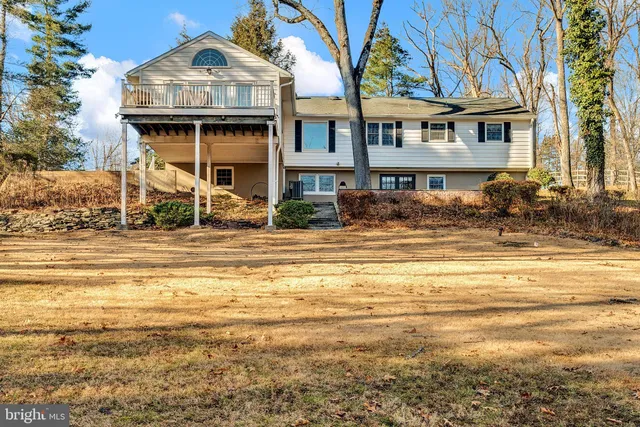 a view of a house with a ocean view