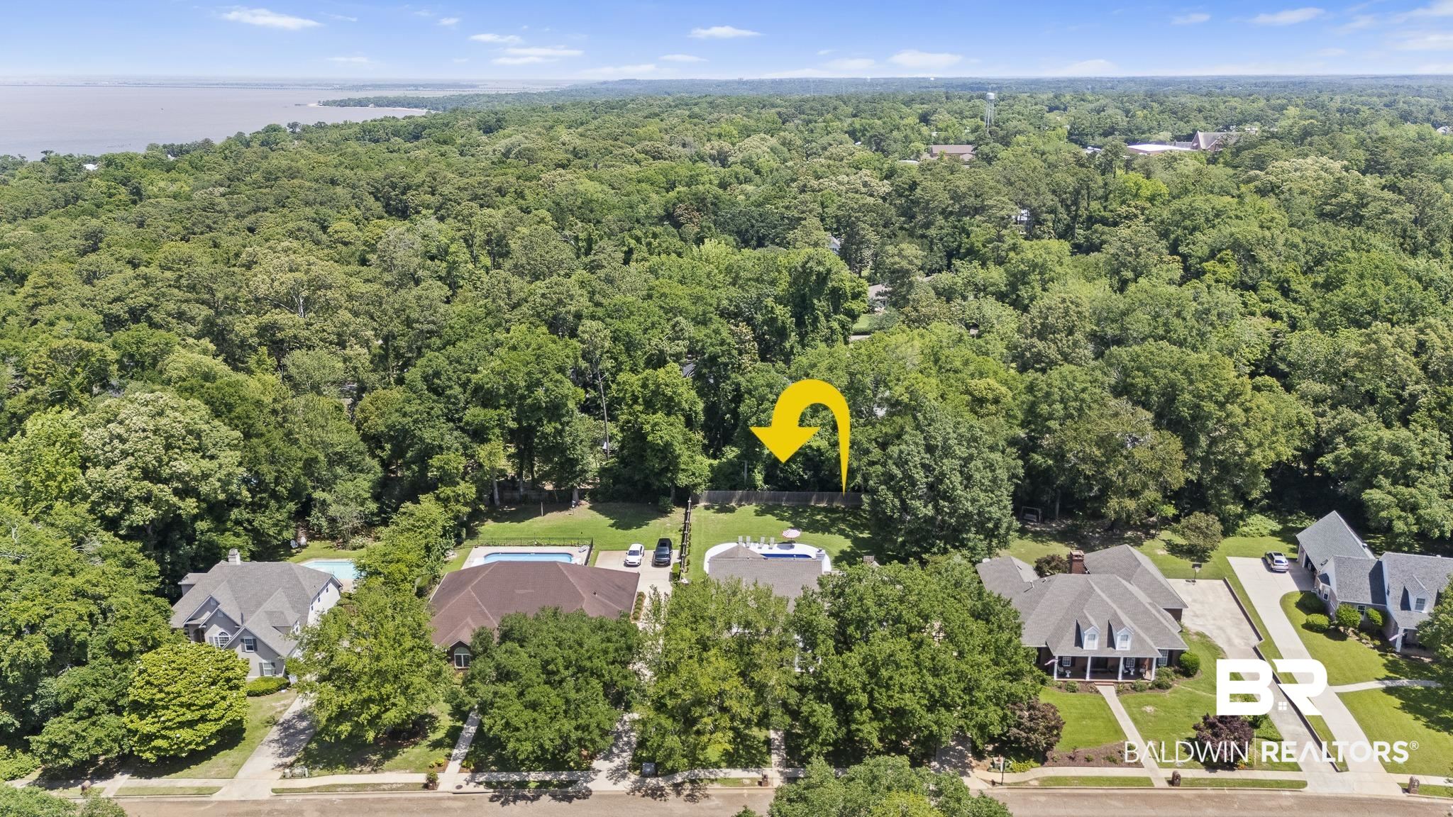 402 Potters Mills Road Daphne, AL 36526 - Photo 41 of 45 Drone / aerial view of a heavily wooded area