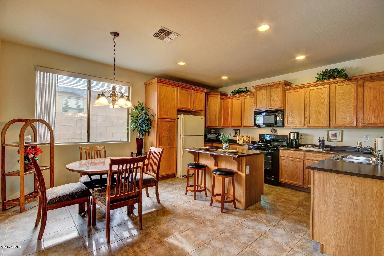 17957 West Hatcher Road Waddell, AZ 85355 - Photo 4 of 16 kitchen