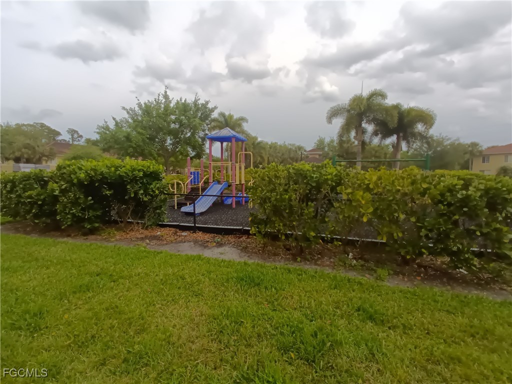 9410 Ivy Brook Run, Unit 206 Fort Myers, FL 33913 - Photo 16 of 16 a view of a park with large trees