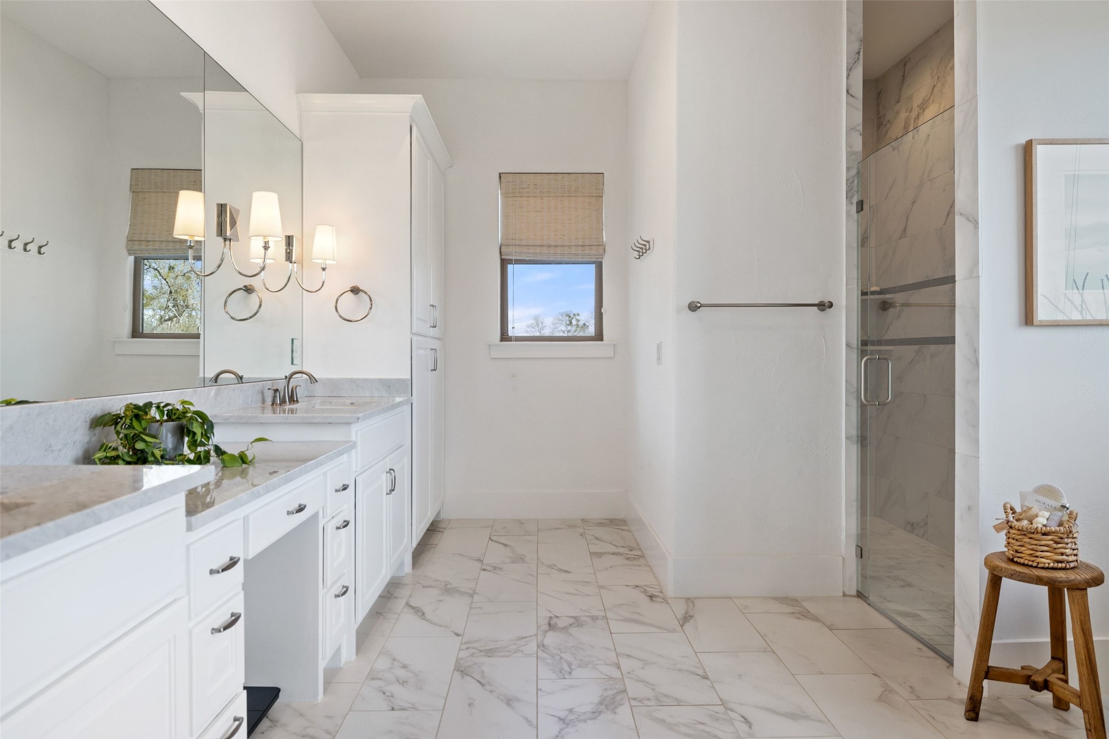 105 Deer Valley Road Georgetown, TX 78628 - Photo 15 of 40 Full bath with double vanity, light marble finish floors, and a marble finish shower