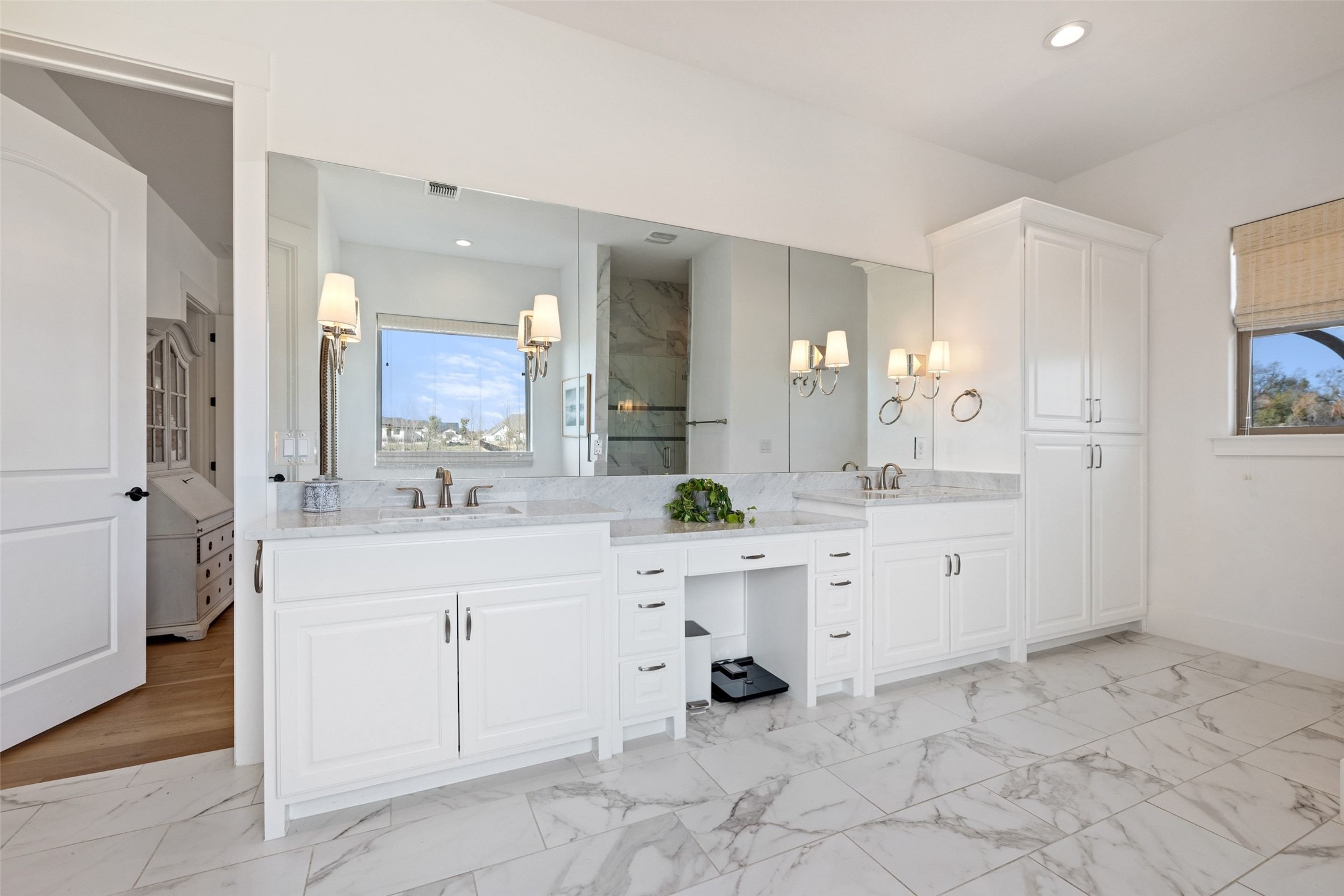 105 Deer Valley Road Georgetown, TX 78628 - Photo 16 of 40 Full bathroom featuring double vanity, light marble finish flooring, and recessed lighting