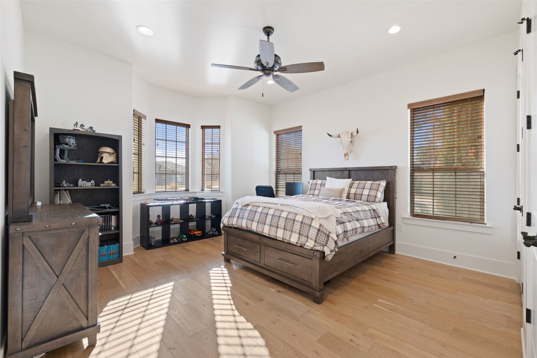 105 Deer Valley Road Georgetown, TX 78628 - Photo 19 of 40 Bedroom featuring light wood-style flooring, a ceiling fan, and recessed lighting