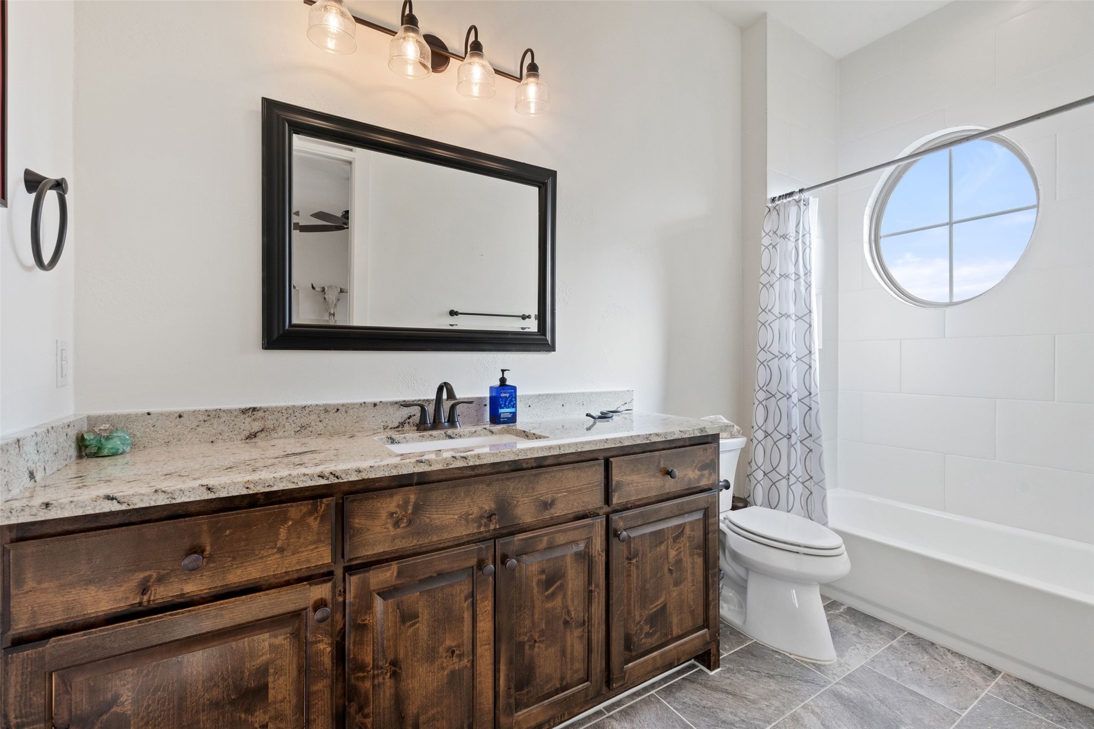 105 Deer Valley Road Georgetown, TX 78628 - Photo 20 of 40 Full bath featuring vanity and shower / bathtub combination with curtain
