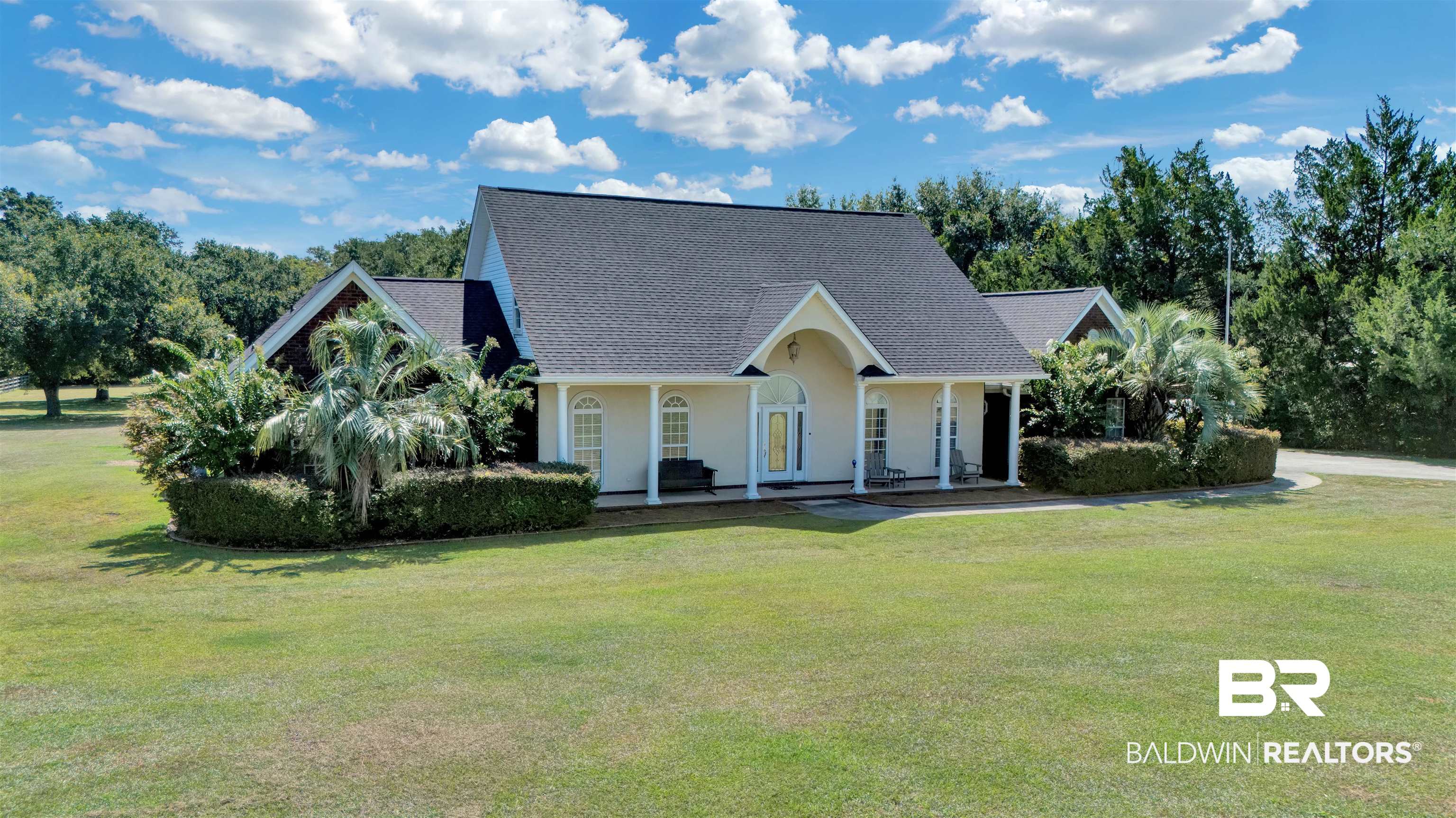 27688 Rigsby Road Daphne, AL 36526 - Photo 2 of 56 Cape cod-style house with a front lawn and a porch