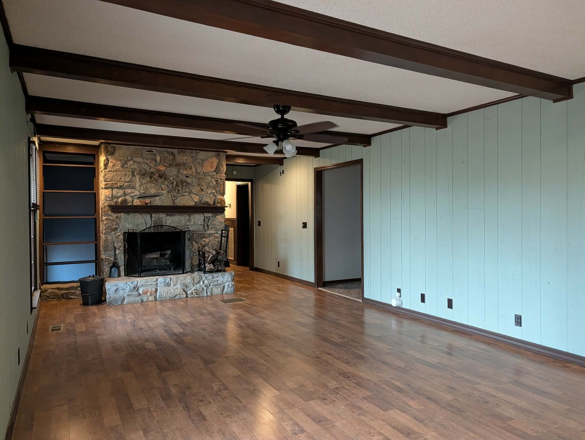 1581 Galen Road Lafayette, TN 37083 - Photo 6 of 36 a view of a livingroom with a fireplace and chandelier