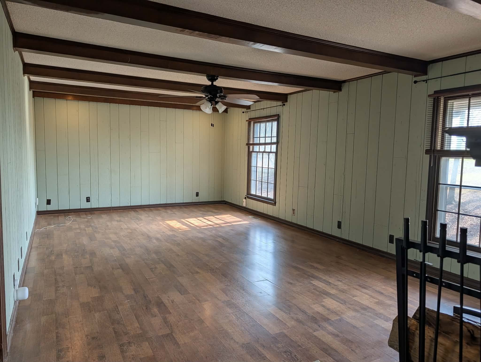 1581 Galen Road Lafayette, TN 37083 - Photo 9 of 36 a view of empty room with wooden floor and fan