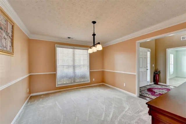 a living room with fireplace furniture and a flat screen tv