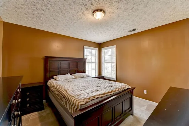 a view of balcony with wooden floor and fence