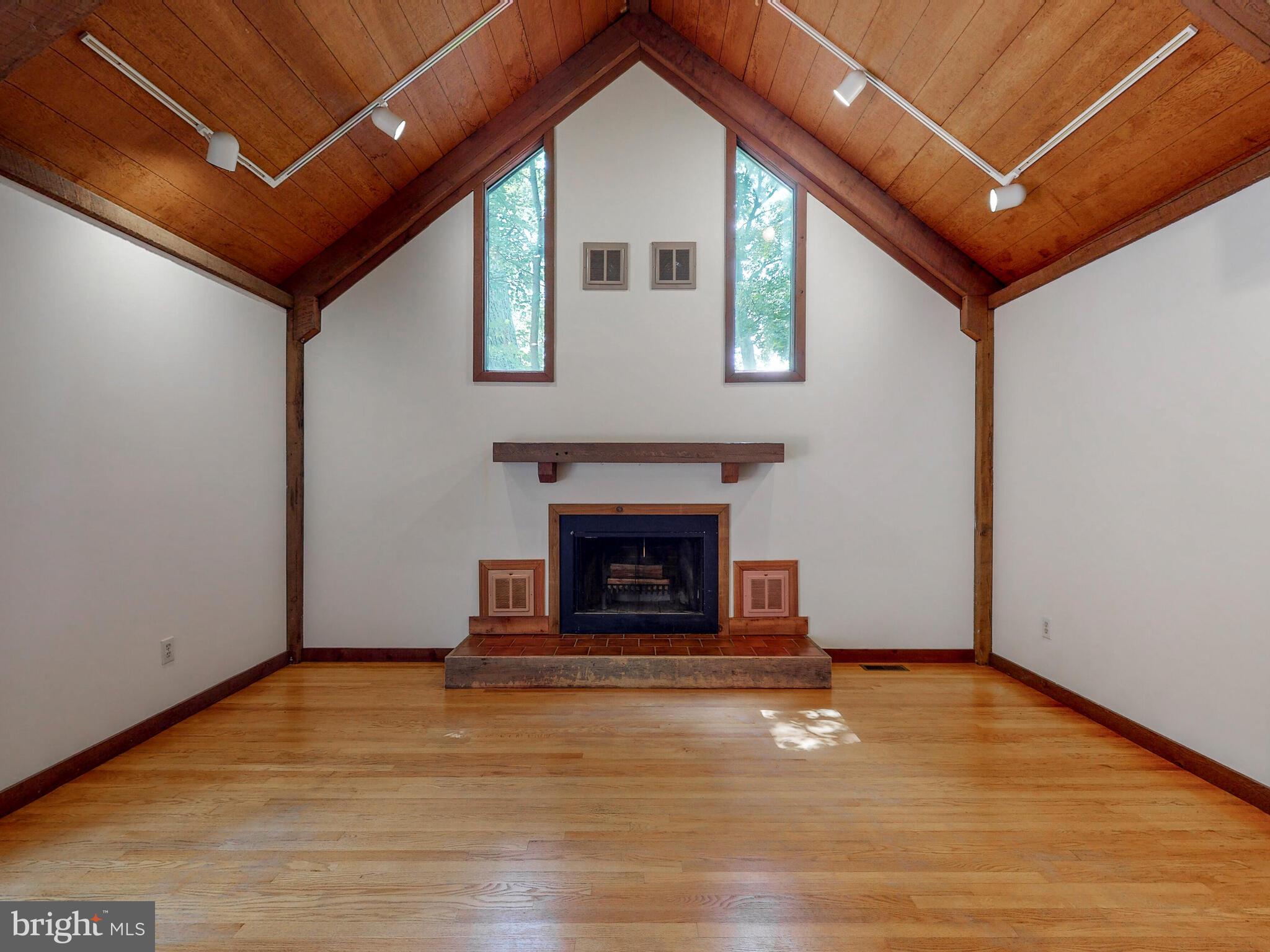 3107 Cabin Run Road Woodbine, MD 21797 - Photo 13 of 50 Living Room With Wood-Burning Fireplace