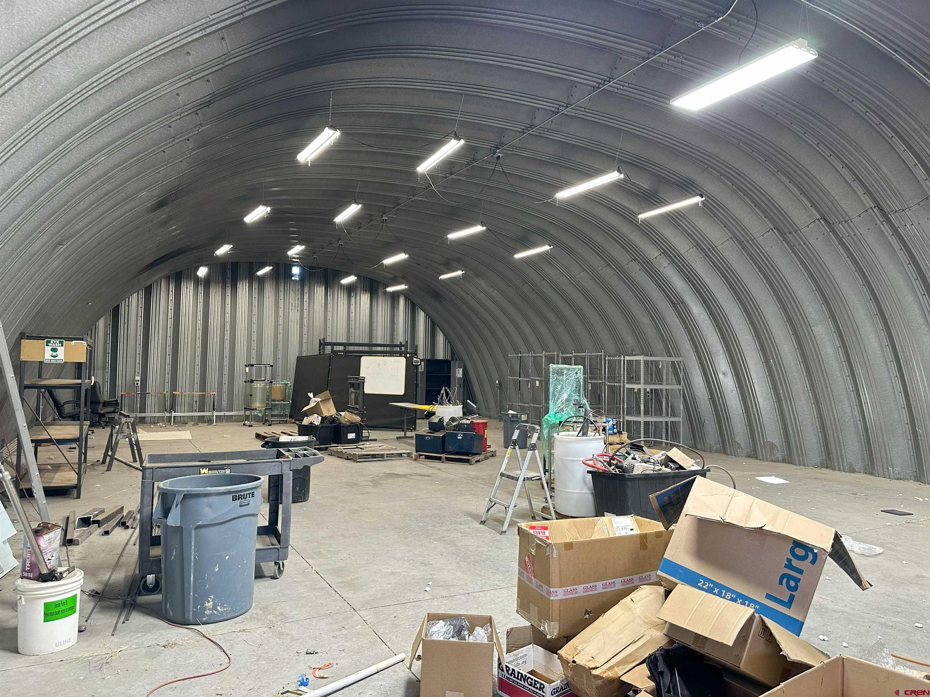 18668 B50 Road, Unit BUILDING E Delta, CO 81416 - Photo 2 of 5 a workspace with furniture and a kitchen
