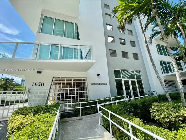 a balcony view with an outdoor space