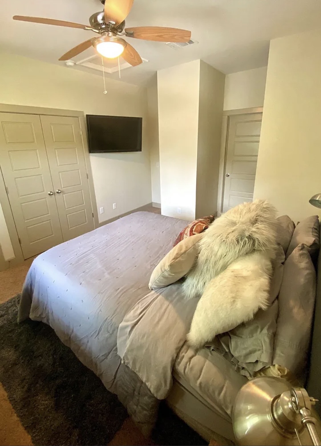 903 Cardinal Lane, Unit A Austin, TX 78704 - Photo 15 of 23 Bedroom with a closet, a ceiling fan, and carpet floors