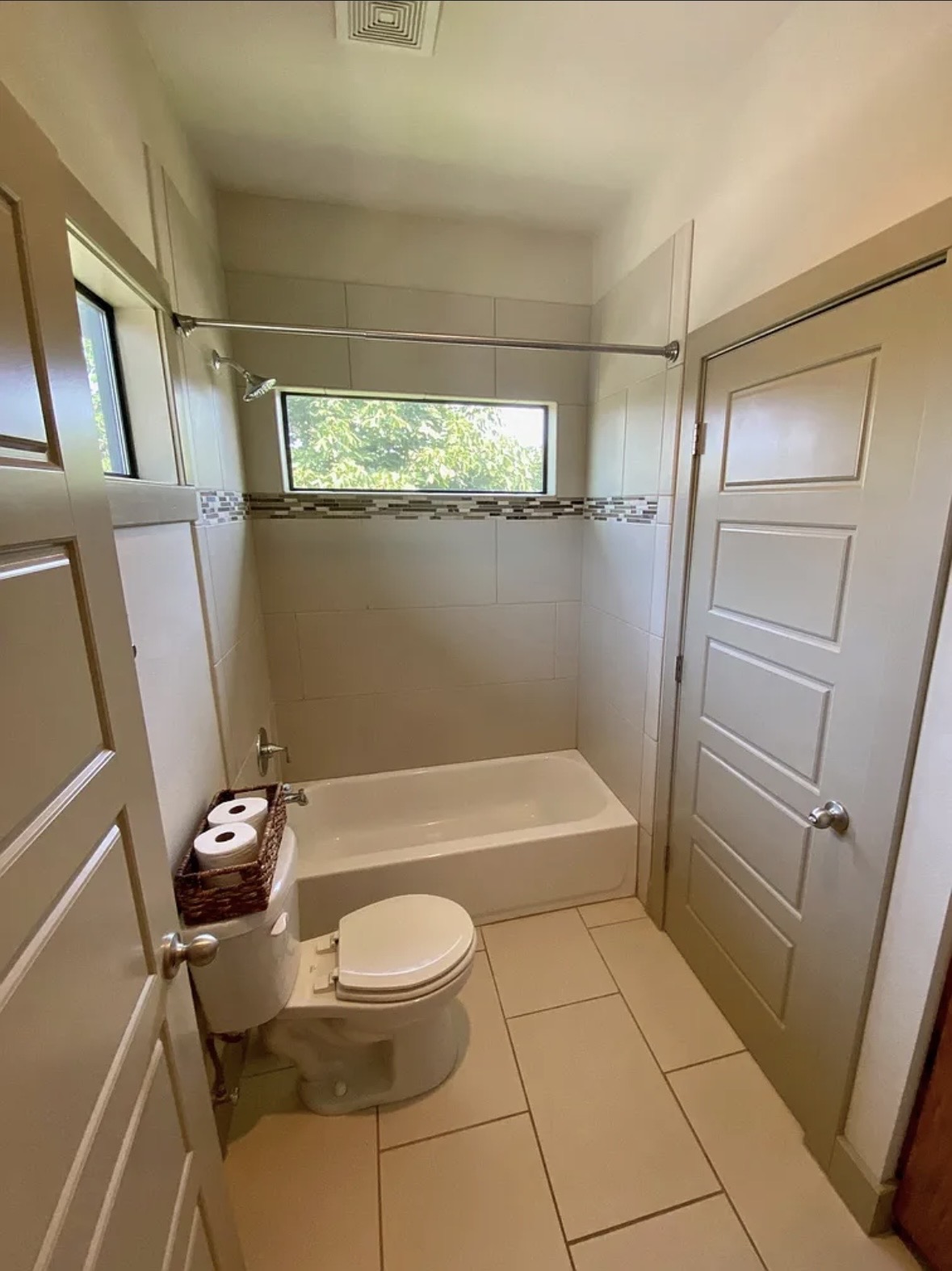 903 Cardinal Lane, Unit A Austin, TX 78704 - Photo 17 of 23 Bathroom with shower / bathtub combination and light tile patterned floors