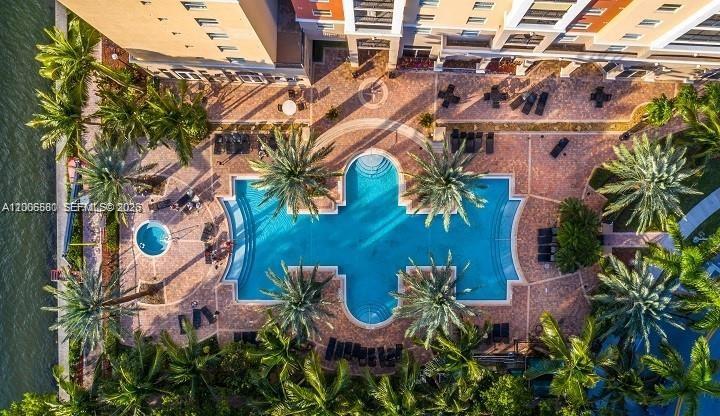 17150 North Bay Road, Unit 2602 Sunny Isles Beach, FL 33160 - Photo 3 of 27 an aerial view of a house with garden space and street view