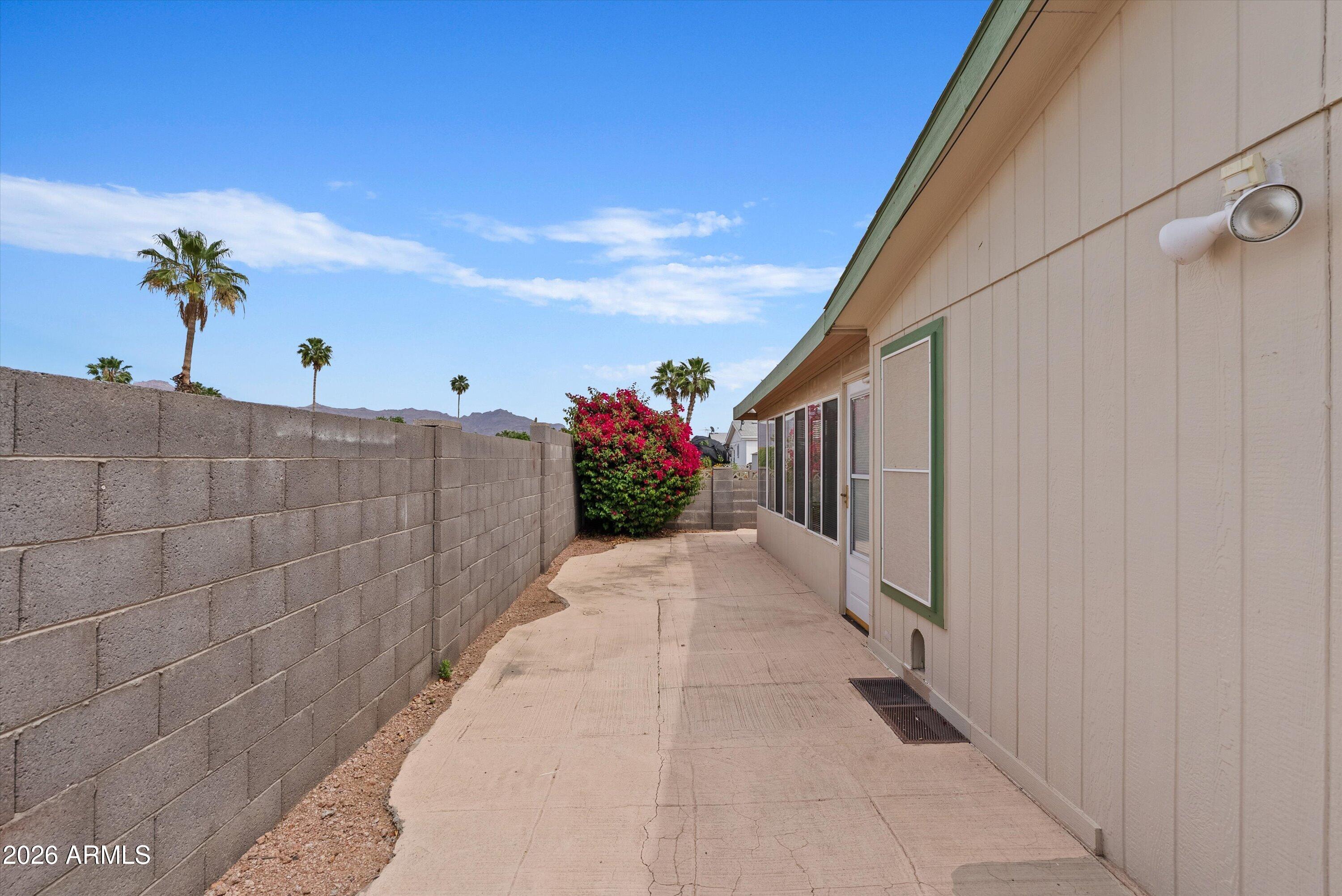 3700 South Tomahawk Road, Unit 16 Apache Junction, AZ 85119 - Photo 26 of 33 BACK EXTERIOR