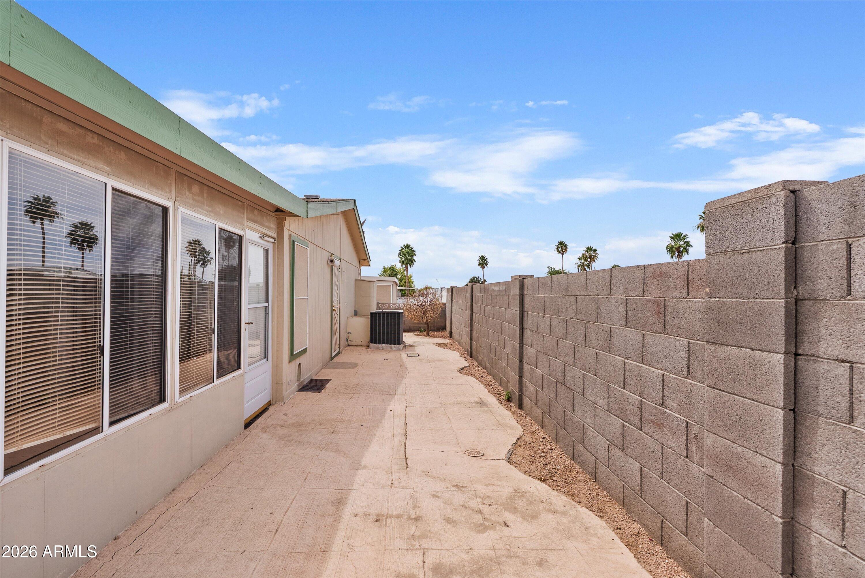 3700 South Tomahawk Road, Unit 16 Apache Junction, AZ 85119 - Photo 27 of 33 BACK EXTERIOR