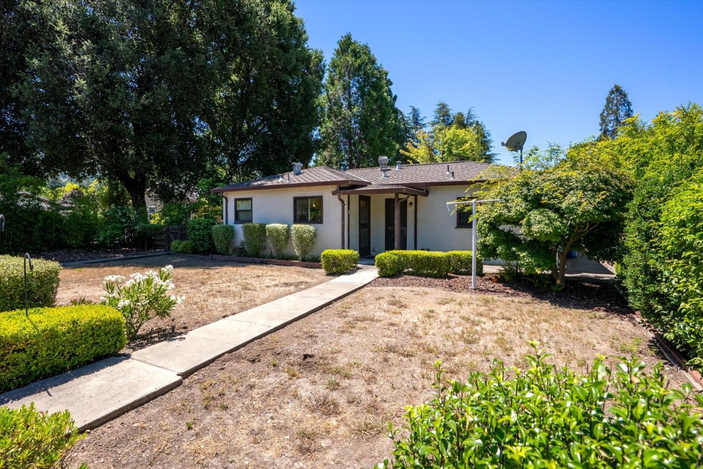 16899 Kennedy Road Los Gatos, CA 95032 - Photo 33 of 61 a view of a house with a small yard and potted plants