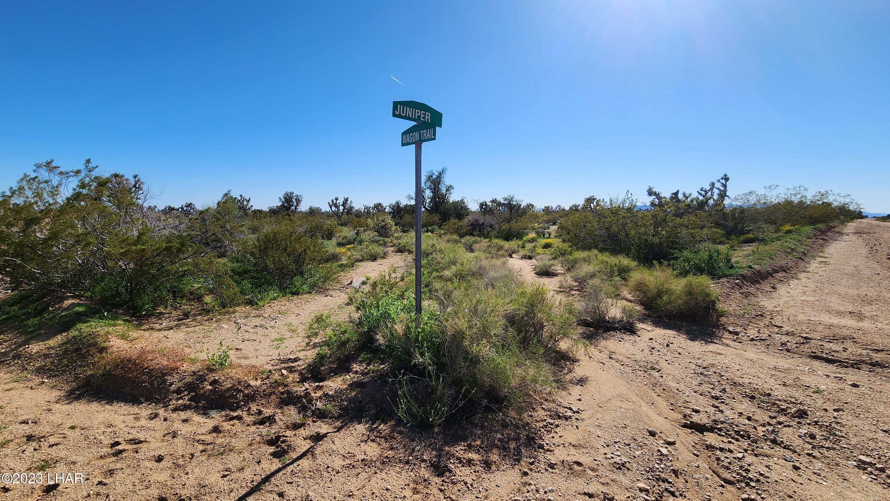 262 South Wagon Trail Road Yucca, AZ 86438 - Photo 11 of 42 SE Corner of Wagon Trail Rd and Juniper Dr