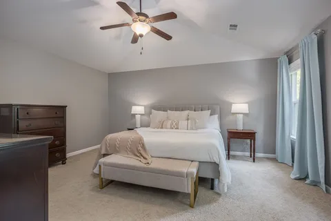 a view of a backyard with swimming pool