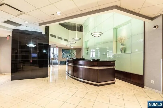 a view of living room and kitchen