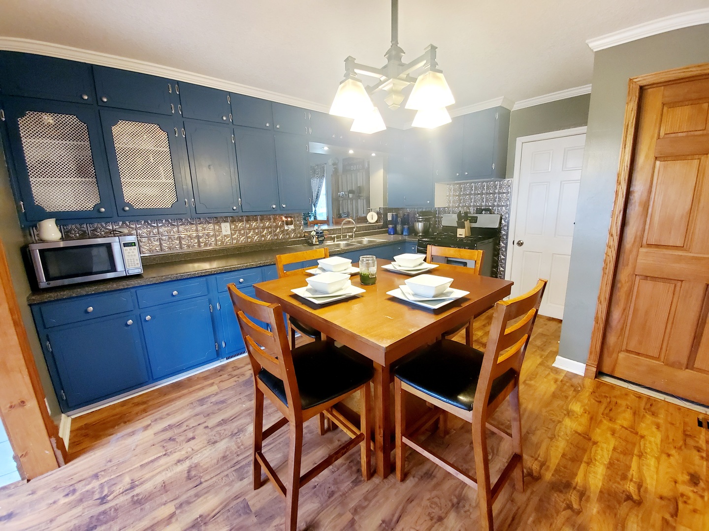 306 North Front Road Danforth, IL 60930 - Photo 8 of 51 a view of a table and chairs in a kitchen