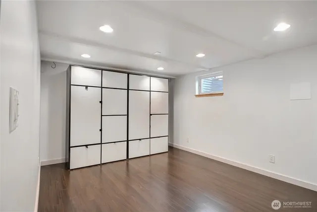 a view of entryway with wooden floor
