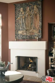 a living room with a fireplace