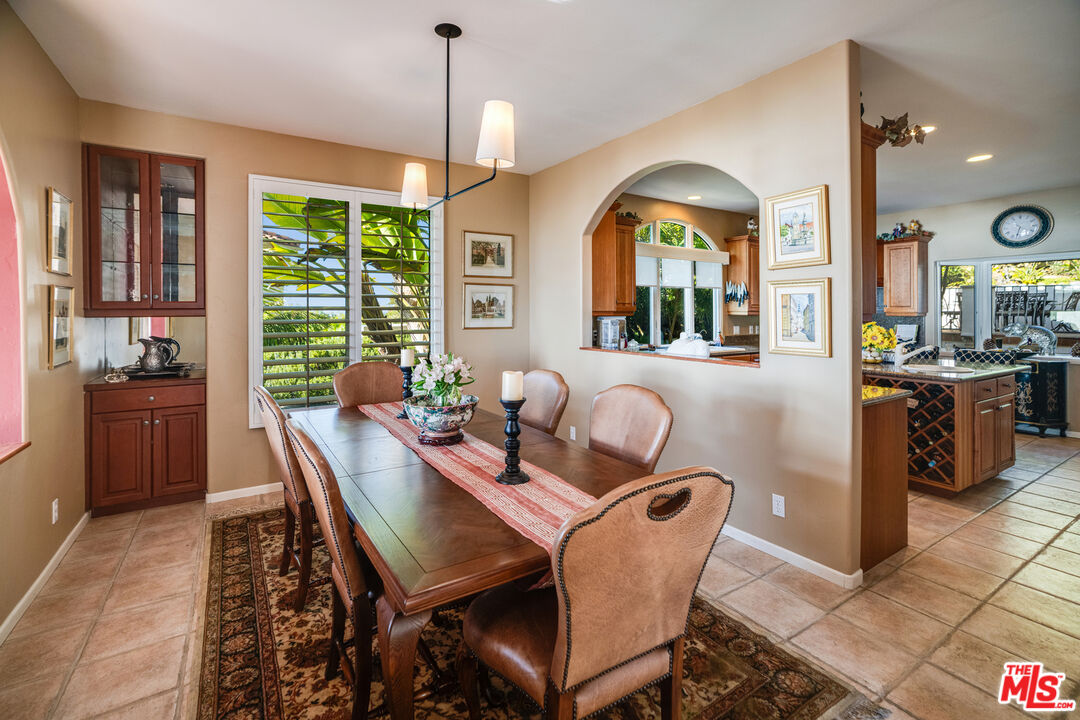 1643 La Vista Del Oceano Santa Barbara, CA 93109 - Photo 15 of 36 a view of a dining room with furniture window and outside view