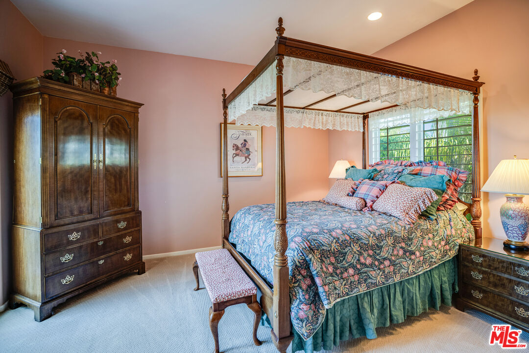 1643 La Vista Del Oceano Santa Barbara, CA 93109 - Photo 29 of 36 a bed room with furniture and a window