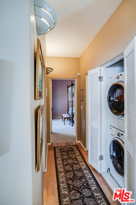 1643 La Vista Del Oceano Santa Barbara, CA 93109 - Photo 31 of 36 a view of a hallway with washer and dryer