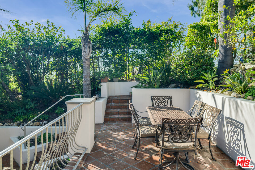 1643 La Vista Del Oceano Santa Barbara, CA 93109 - Photo 34 of 36 a view of a chairs and table in the patio