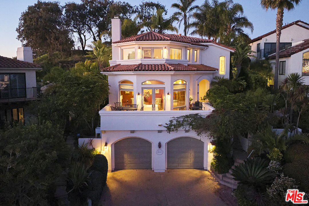 1643 La Vista Del Oceano Santa Barbara, CA 93109 - Photo 7 of 36 a front view of a house with a garden