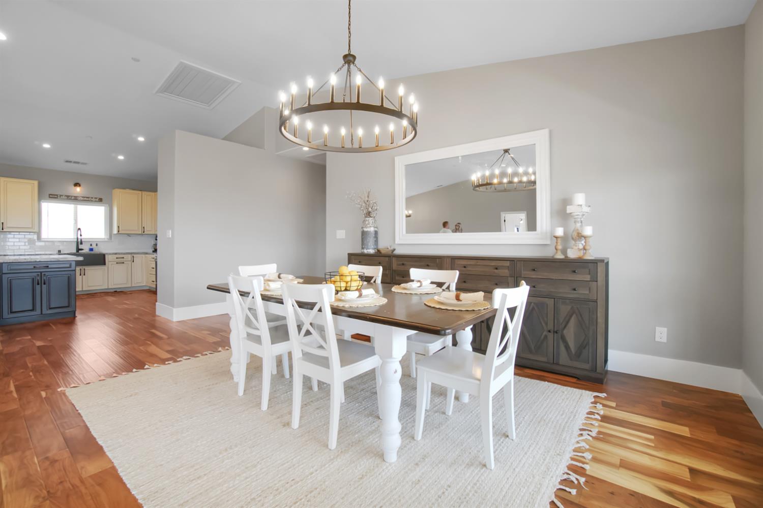 7991 South Shingle Road Shingle Springs, CA 95682 - Photo 15 of 58 a view of a dining room with furniture wooden floor and chandelier