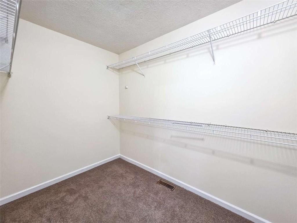 2276 Ramblewood Circle Decatur, GA 30035 - Photo 27 of 34 a view of a room with racks on the wall
