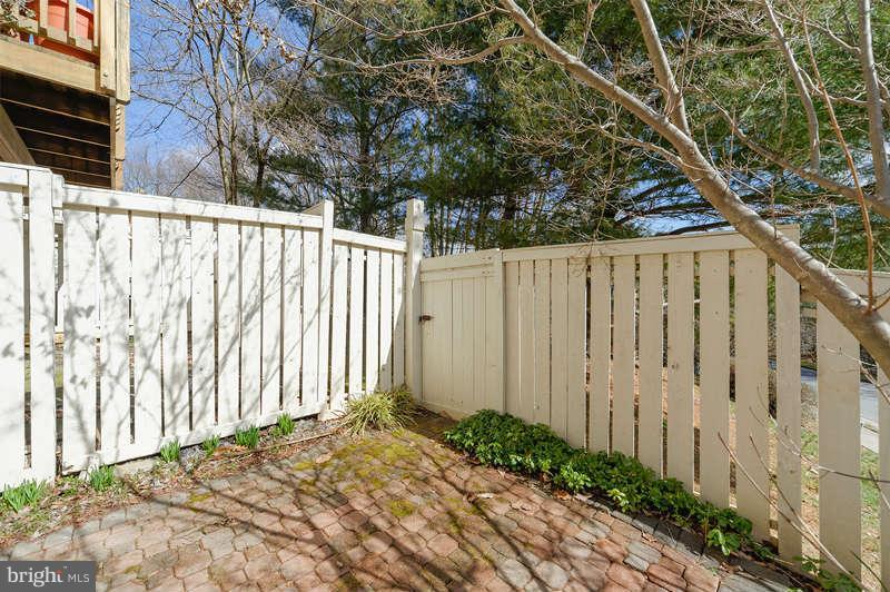 1949 Belmont Ridge Court Reston, VA 20191 - Photo 16 of 23 a view of a backyard with wooden fence