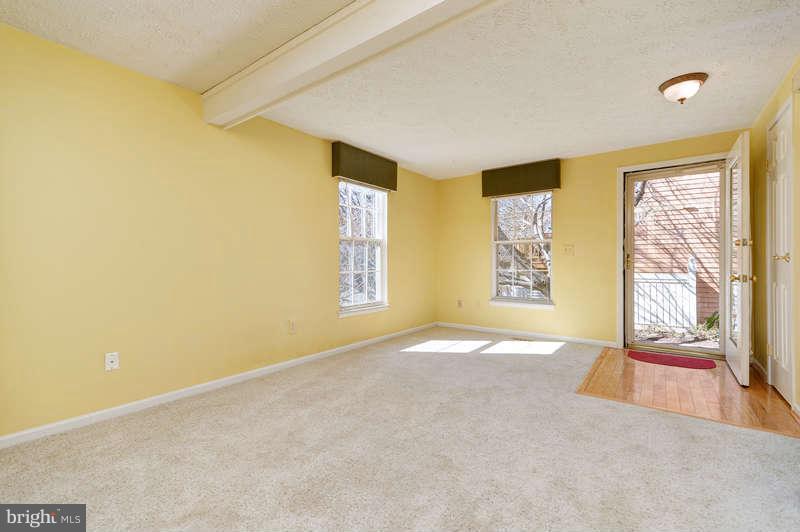 1949 Belmont Ridge Court Reston, VA 20191 - Photo 4 of 23 a view of an empty room with a window