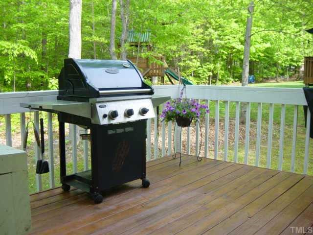 5252 Fairmead Circle Raleigh, NC 27613 - Photo 11 of 12 This freshly stained deck is great for entertaining guests and barbecuing on those fun, summer days. Other