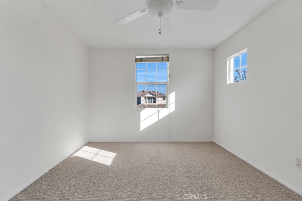 11205 Salerno Porter Ranch Porter Ranch, CA 91326 - Photo 29 of 43 an empty room with windows