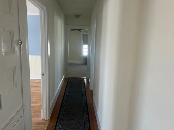 a view of hallway with shower