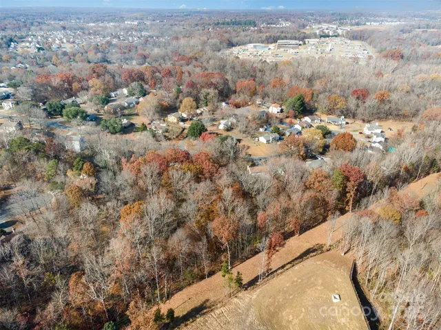 an aerial view of residential house with outdoor space