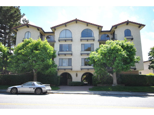 555 Palm Avenue, Unit 207 Millbrae, CA 94030 - Photo 1 of 21 a front view of a house with a garden