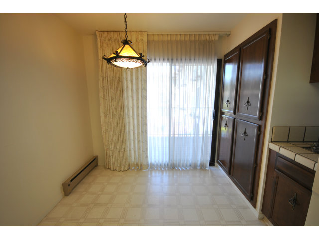 555 Palm Avenue, Unit 207 Millbrae, CA 94030 - Photo 13 of 21 a view of a kitchen with a sink
